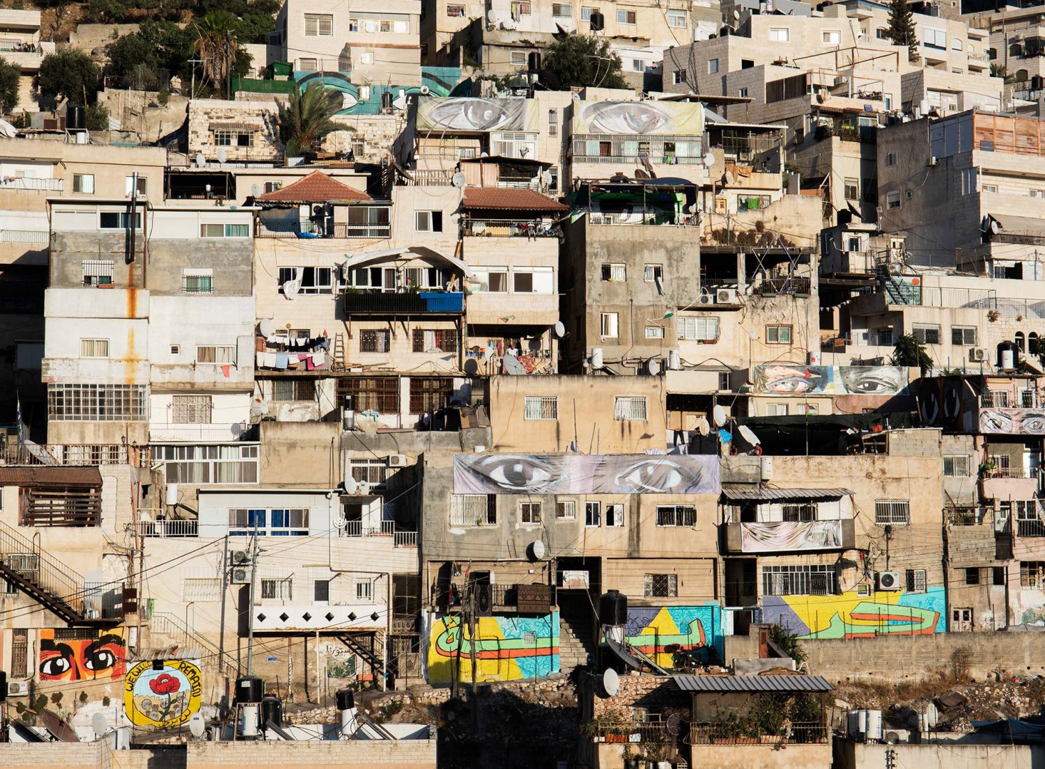 Pairs of grafitti eyes look out from the Batn al-Hawa neighborhood of Silwan in East Jerusalem