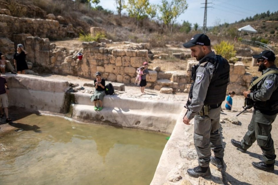 Israeli soldiers guard ‘Ayn Hinya spring, part of an Israeli national park mostly built on al-Walaja's land.