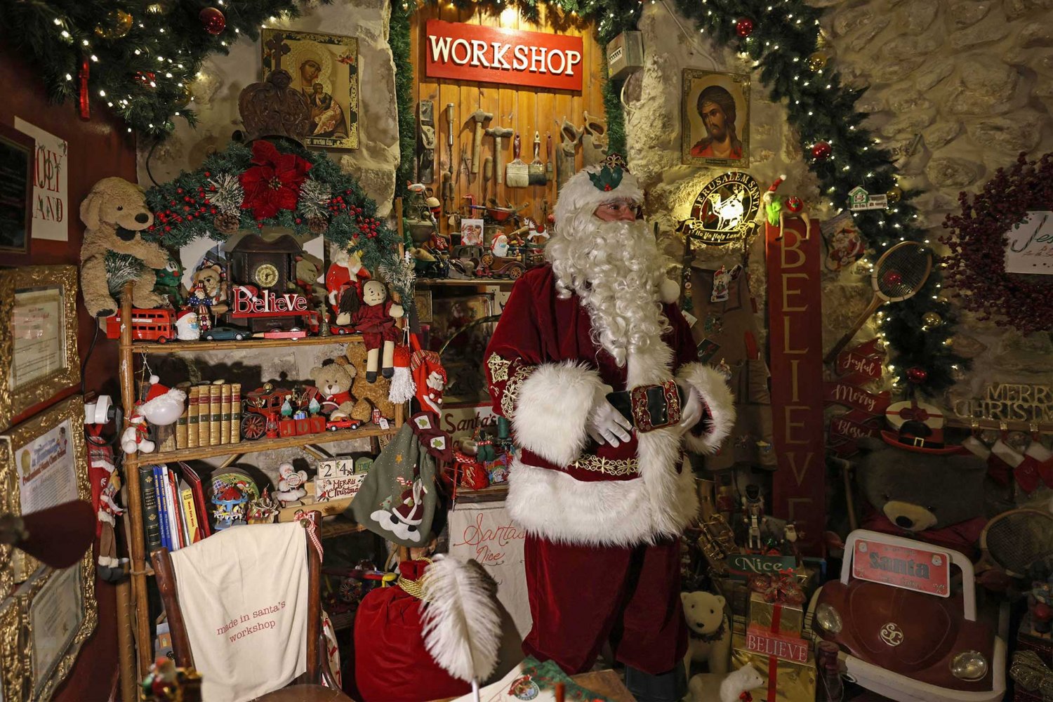 Jerusalem’s Santa Claus, pictured in the workshop area of the “Santa’s House” he created in his Jerusalem home