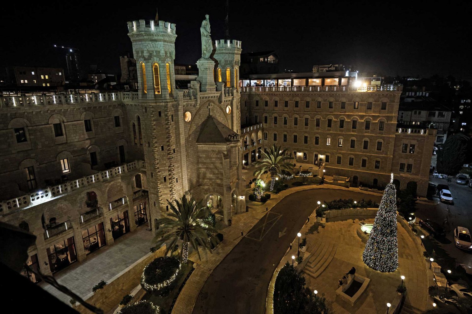 Christmas tree and lights at the Notre Dame of Jerusalem Centre, a guesthouse for pilgrims, at the St Louis French Hospital in the Old City of Jerusalem