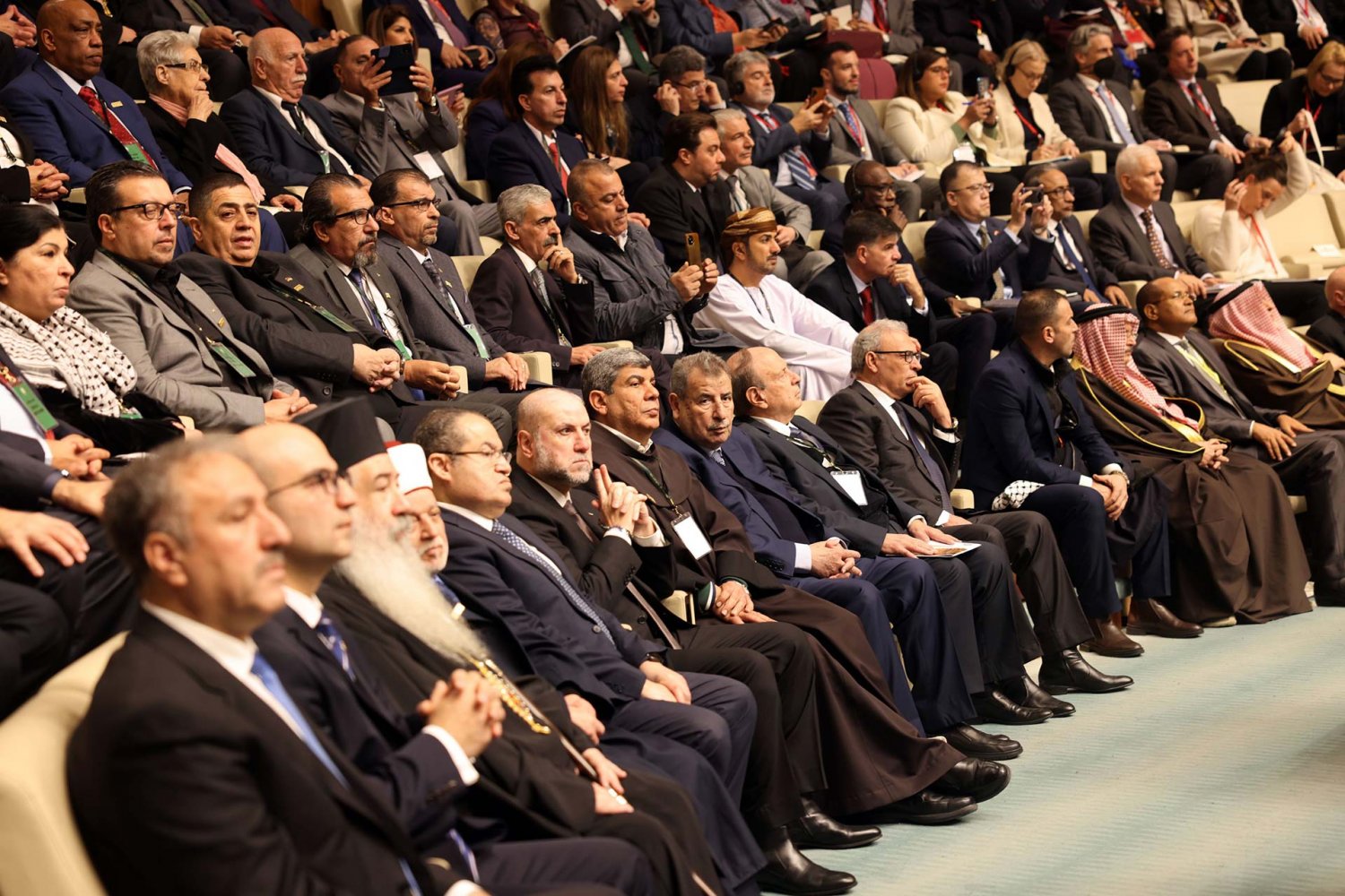 The audience listens attentively at the Arab League conference, "In Support of Jerusalem."