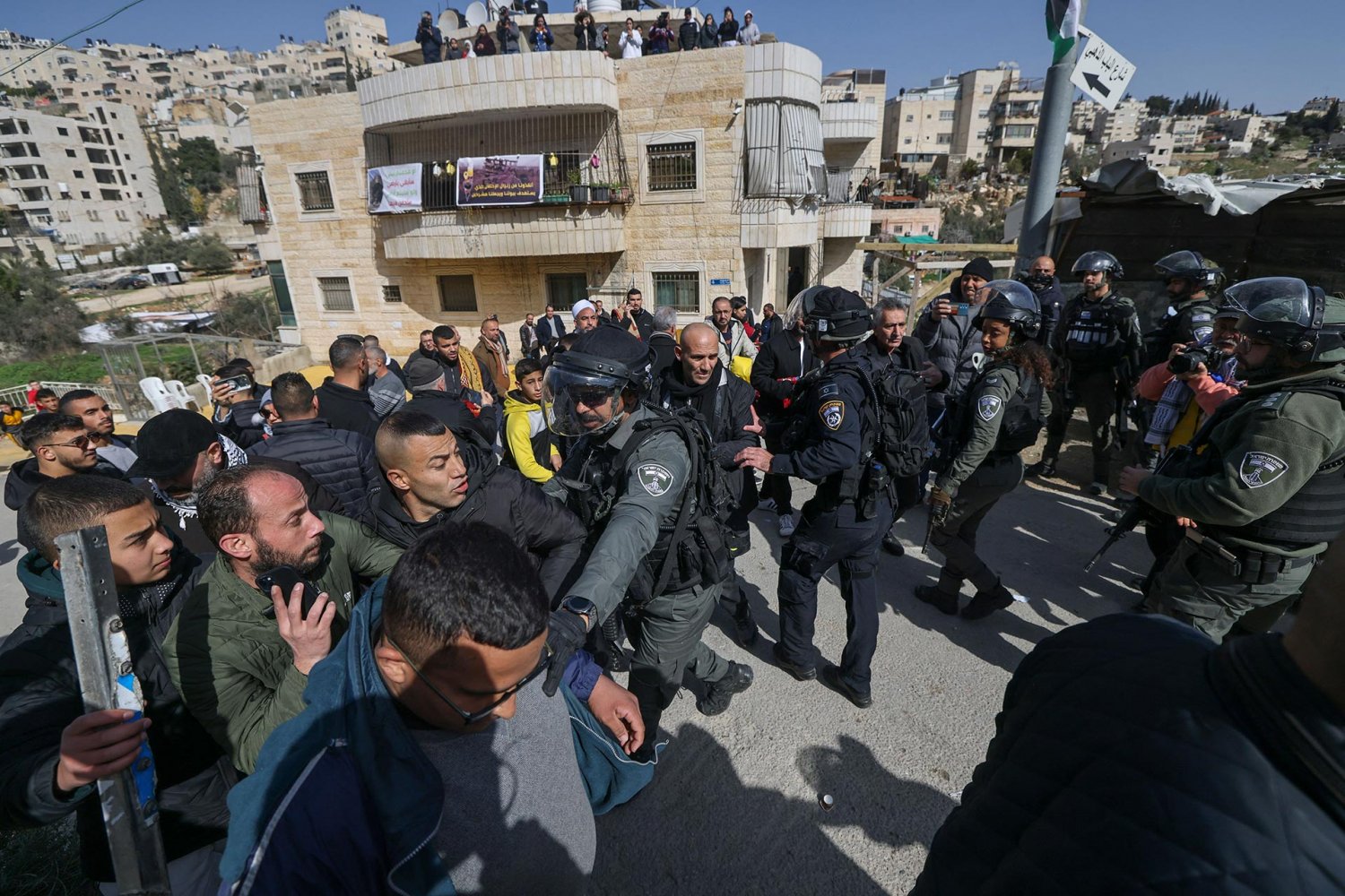Police forcibly break up a solidarity prayer by East Jerusalem Muslims at a building slated for demolition