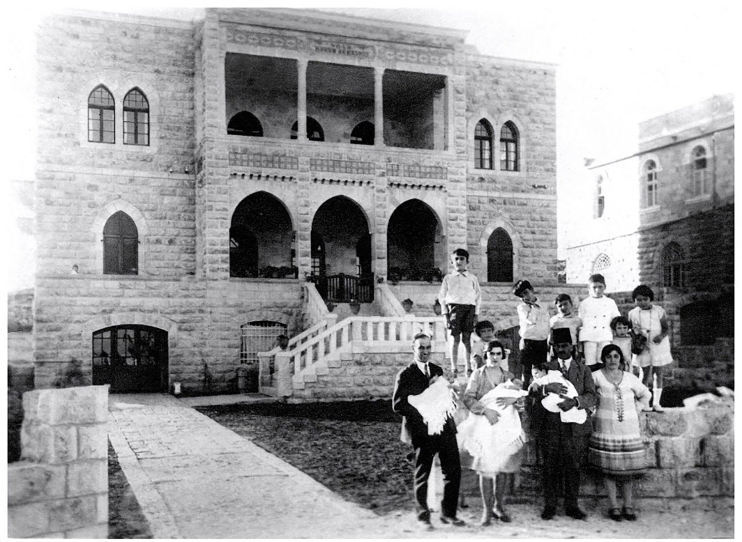 Hanna and Mathilde Bisharat and family in front of their Jerusalem home, Villa Harun al-Rashid, ca. 1929