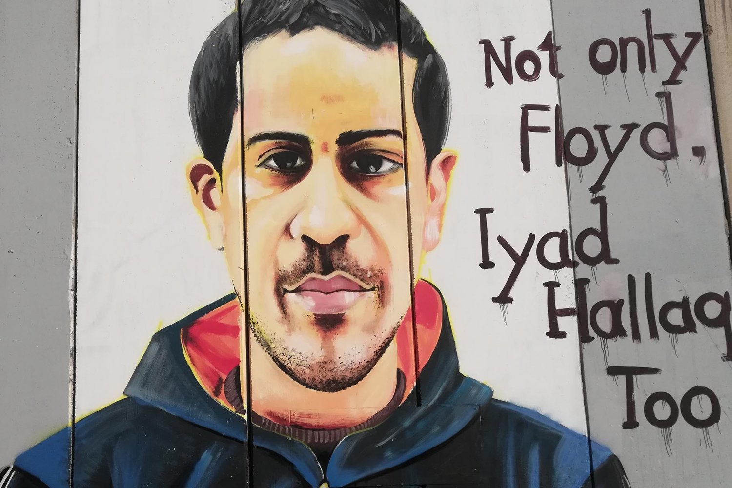 Separation Wall mural near Bethlehem compares slain Palestinian Eyad Hallaq to George Floyd, an unarmed Black man killed in the US by a white policeman.