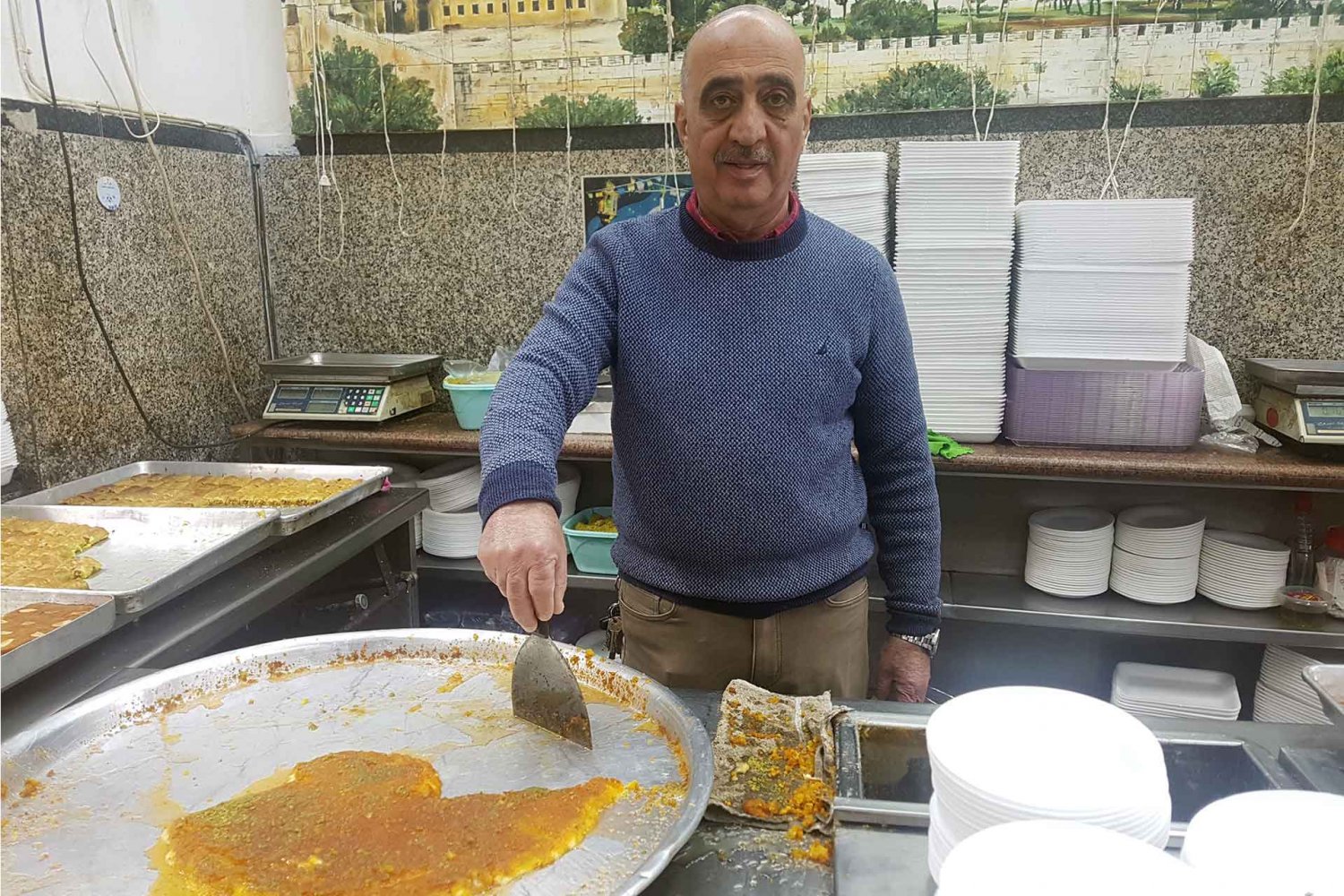 Othman Jaafar, owner of Jaafar Sweets in the Khan al-Zeit neighborhood of the Old City, November 23, 2023