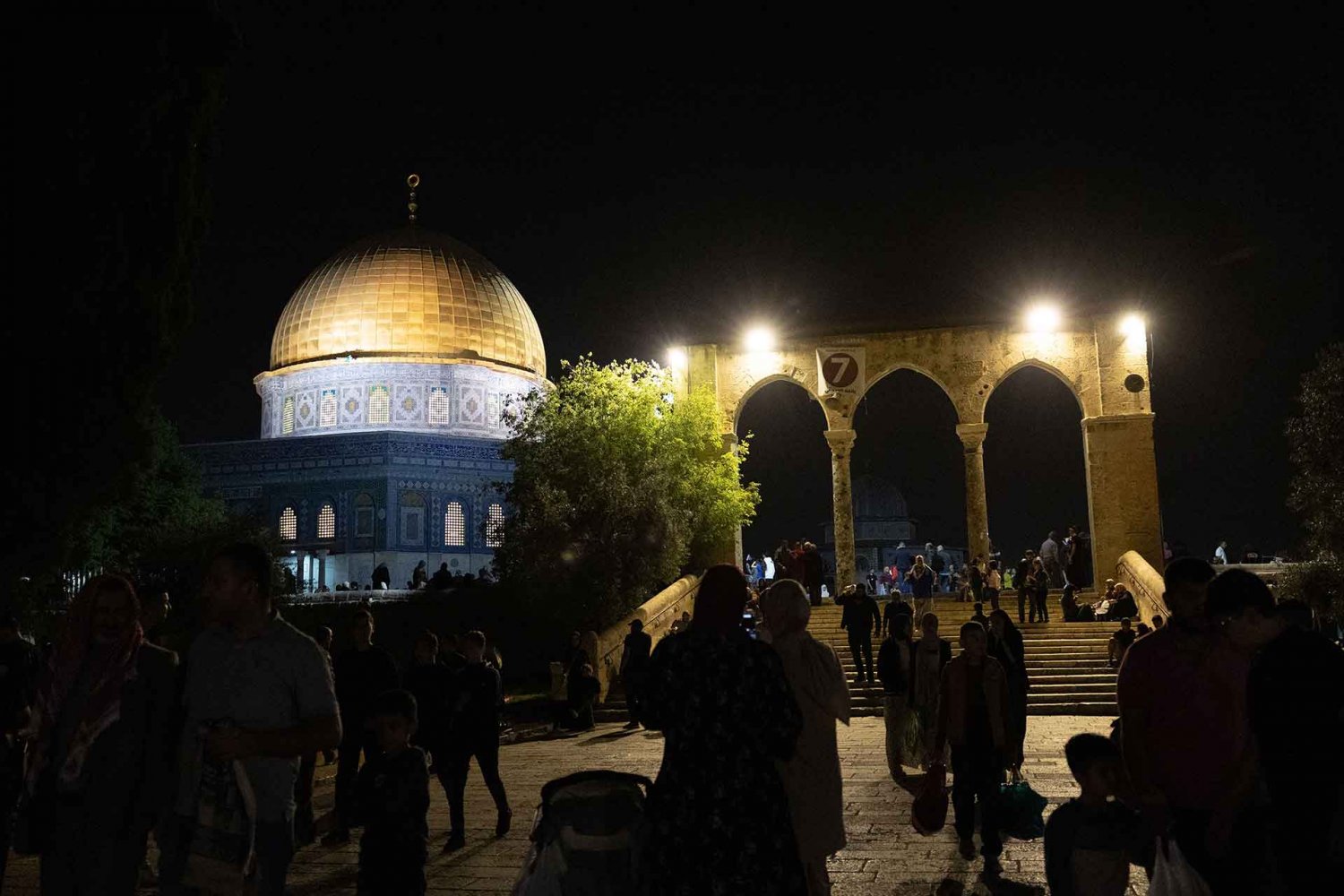 Muslim worshippers find community on the grounds of al-Aqsa Mosque on a night during Ramadan, April 2022.
