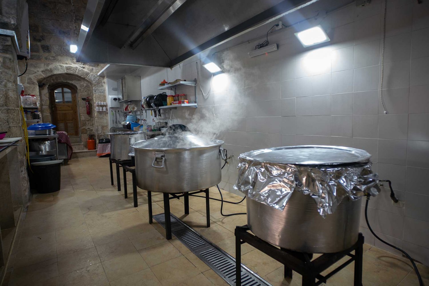 Jerusalem soup kitchen prepares meals for needy during Ramadan.