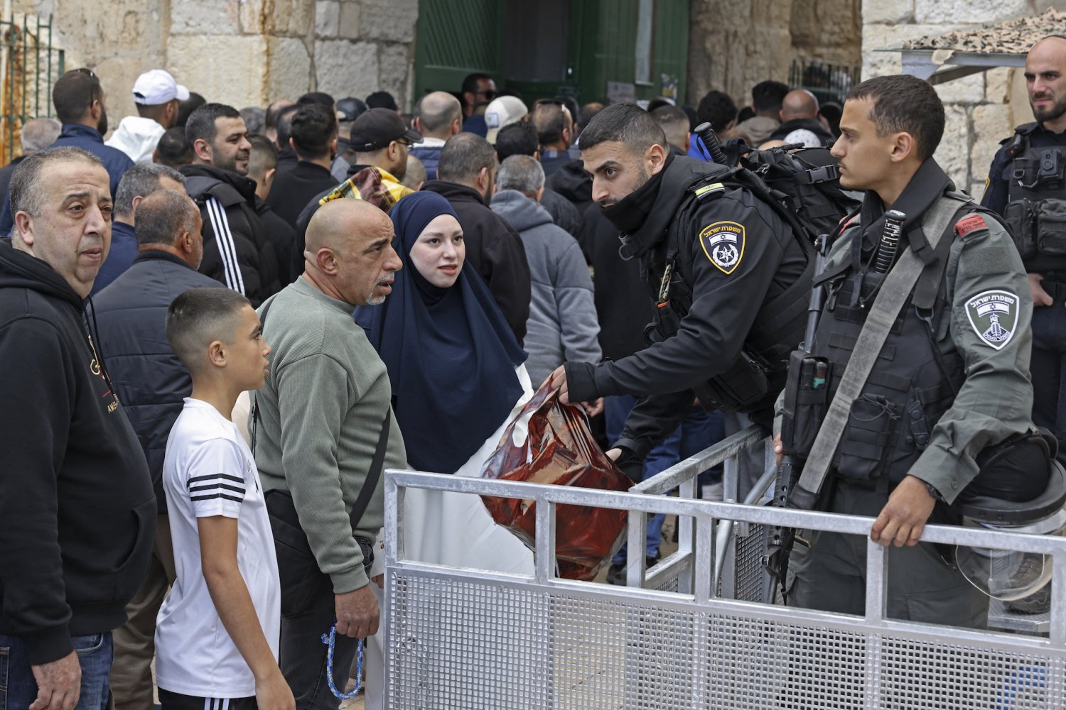 Israeli security forces outside the al-Aqsa mosque compound as Muslim devotees arrive to pray on the first Friday of Ramadan in Jerusalem’s Old City, March 15, 2024