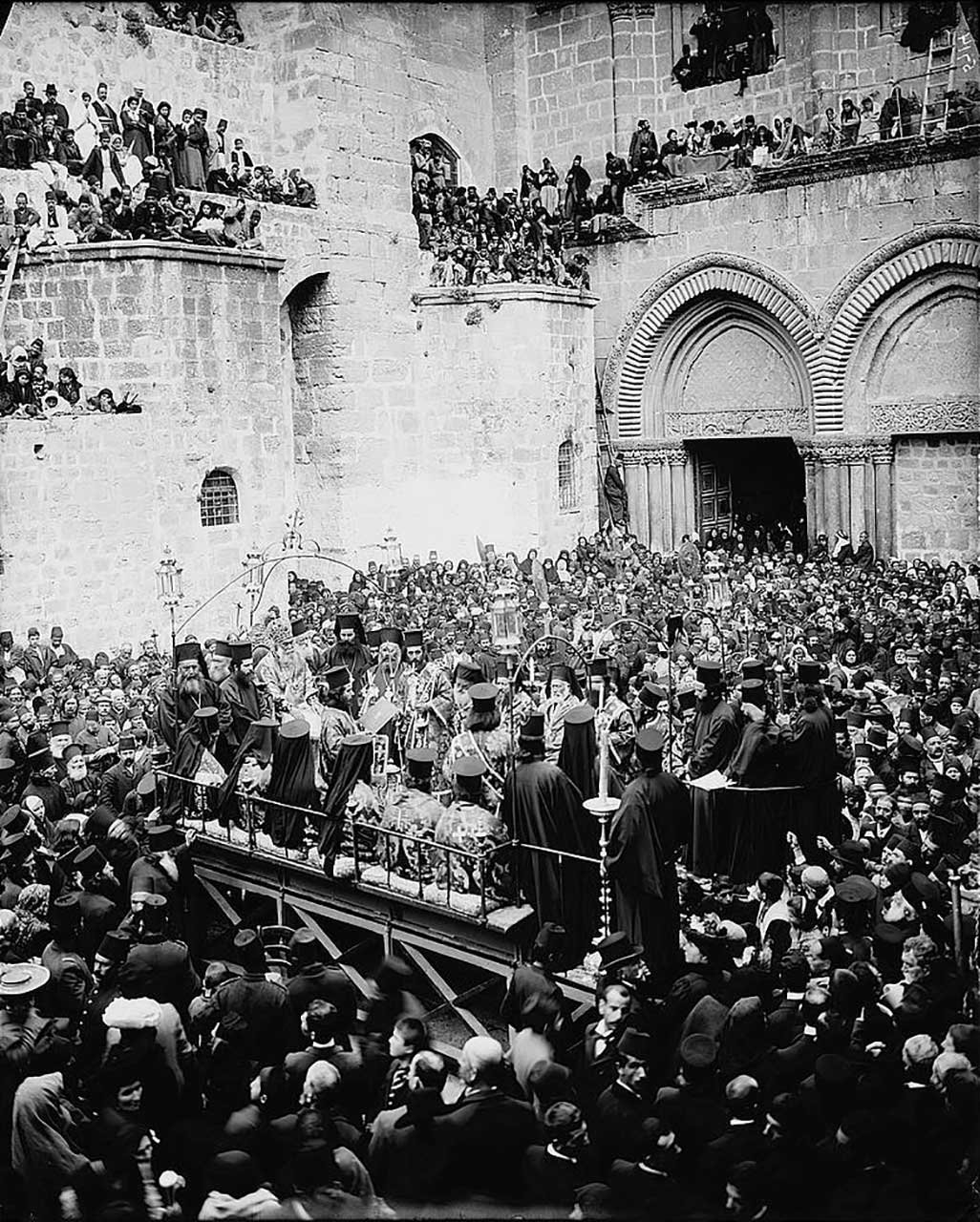 A 1930s photo from Easter week in Jerusalem, with crowds from across the region and the world gathered at the entrance of the Church of the Holy Sepulchre in Jerusalem