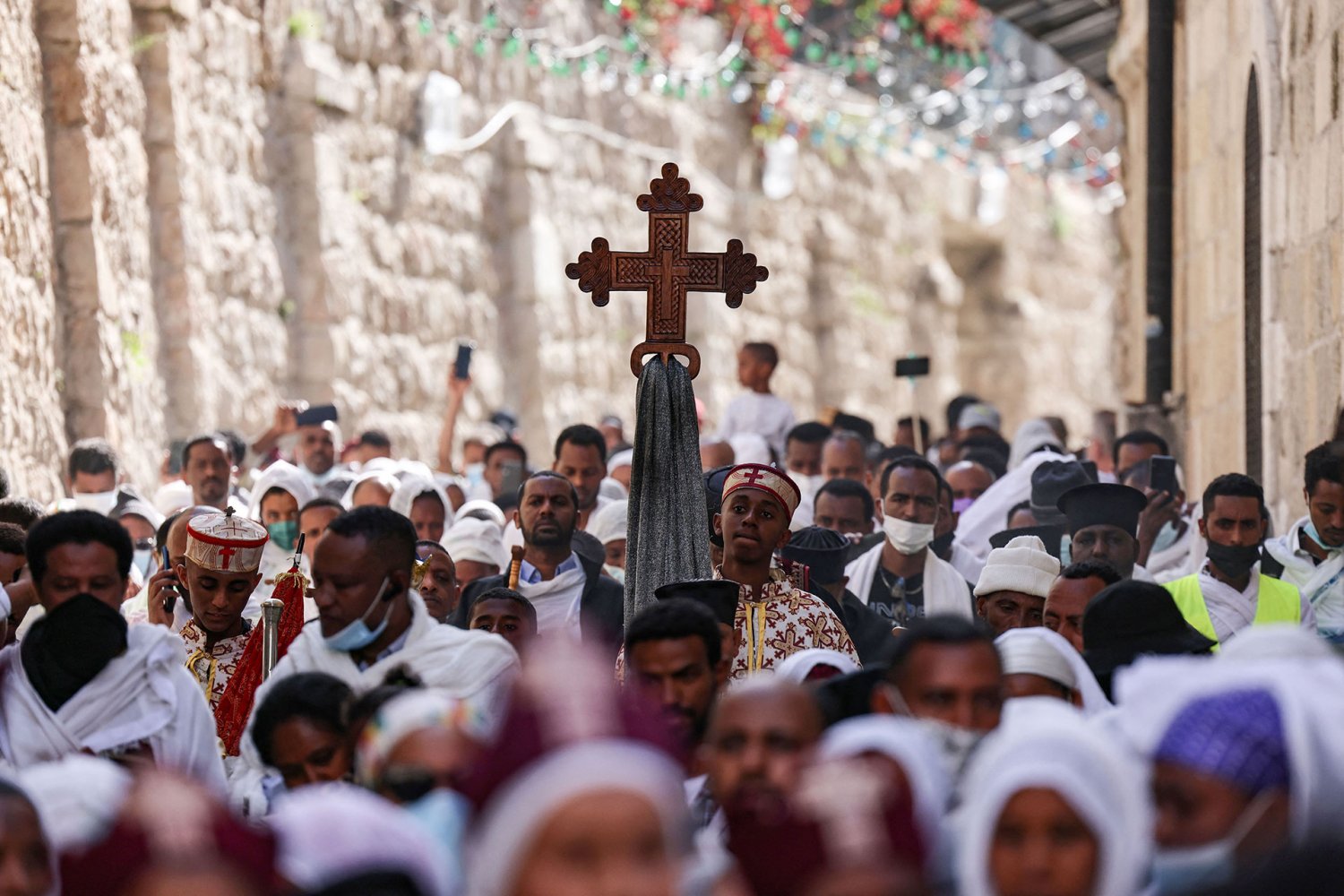 Ethiopian Christian worshippers take part in a Good Friday procession around Jerusalem, April 30, 2021.