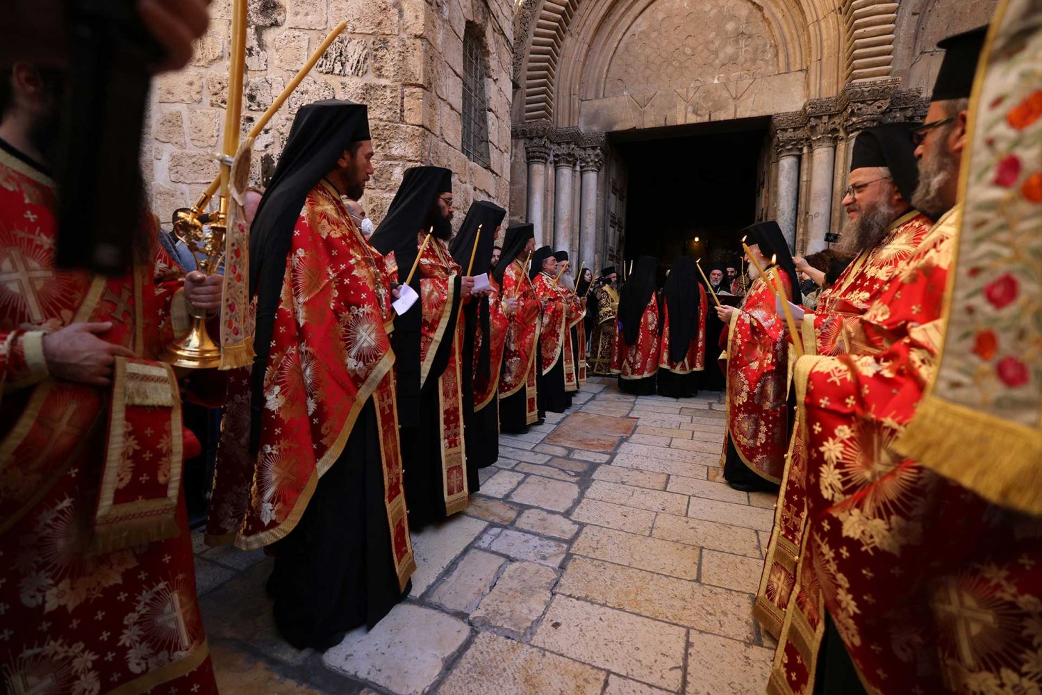 Greek Orthodox priests arrive for a foot-washing ceremony in Jerusalem, April 2022